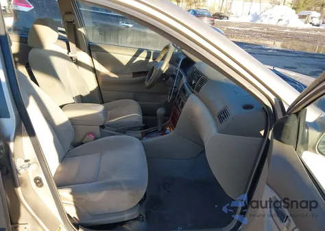 2004 Toyota Corolla Le z USA, uszkodzony, nr VIN 2T1BR38E24C286221